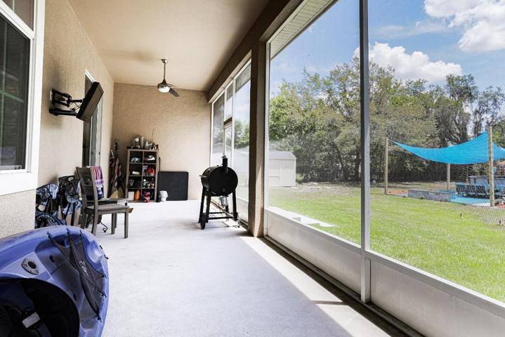 Large screened-in back patio