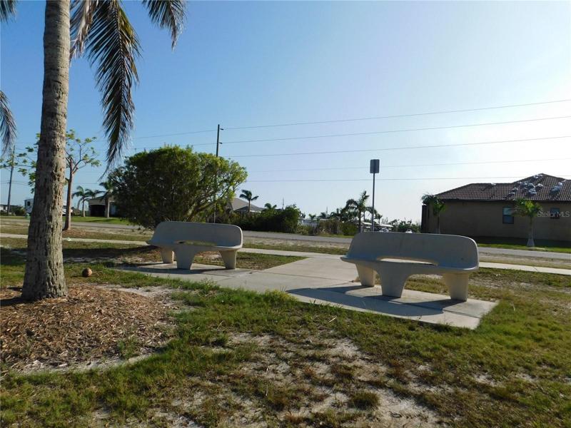 Benches overlooking the water by the canal.