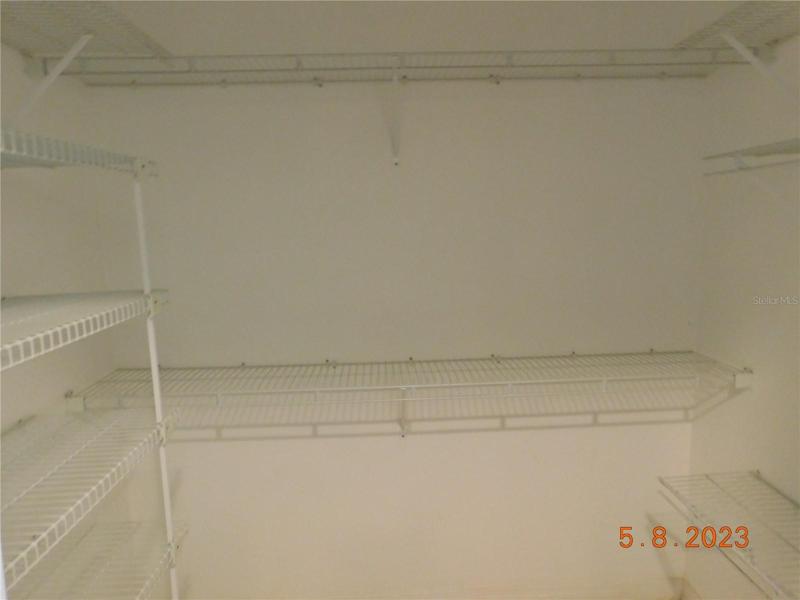 one of two walk-in ensuite closets