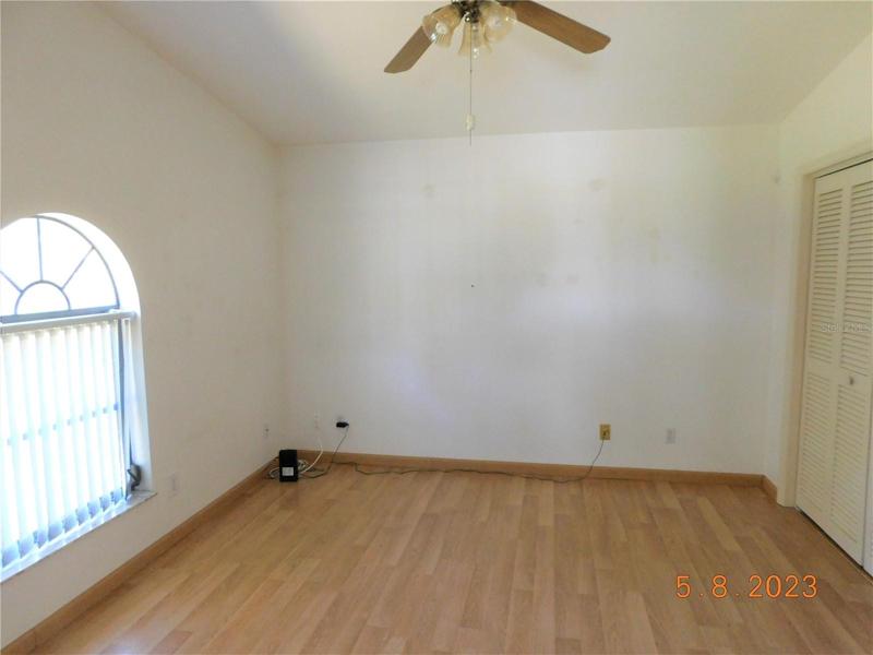 one of three auxiliary bedrooms