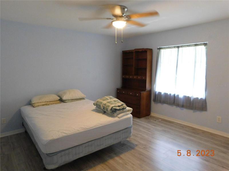 one of three auxiliary bedrooms