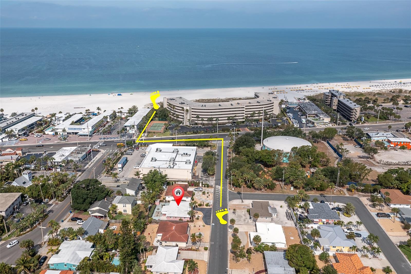 Steps to traffic light then cross Gulf Blvd to deeded walk-way to Gulf of Mexico, white sandy beach.