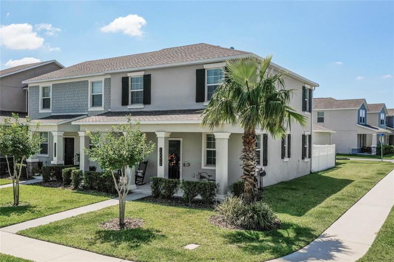 Corner lot home with mature landscape!