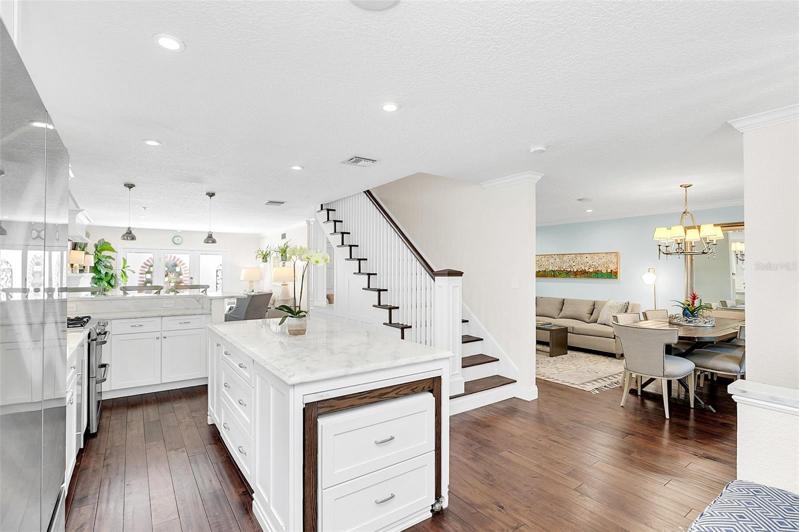 Open & updated, white marble kitchen- TONS of storage!