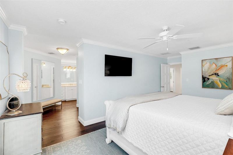 Main Suite- en-suite bath, His & Hers walk-in closets, linen closet, & vanity nook & dressing area.