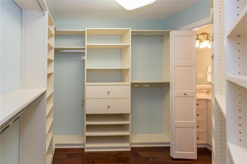 Main Suite- spacious, custom walk-in closet (1 of 2).