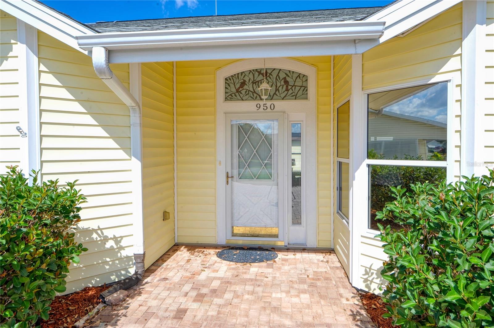 Front entry with expanded paver area. Just very clean cut and inviting
