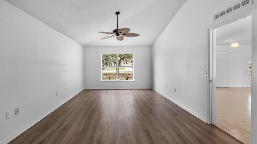 Master bedroom with new flooring, view 2
