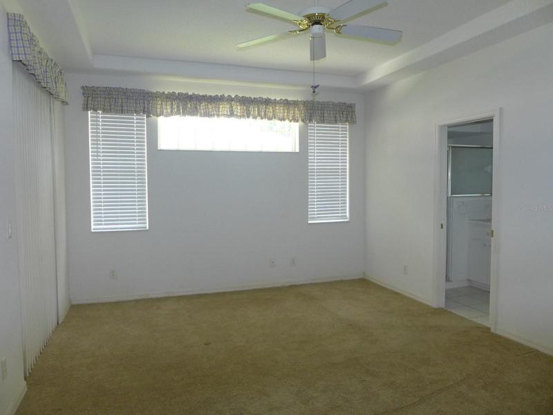 Master bedroom with sliders and bath