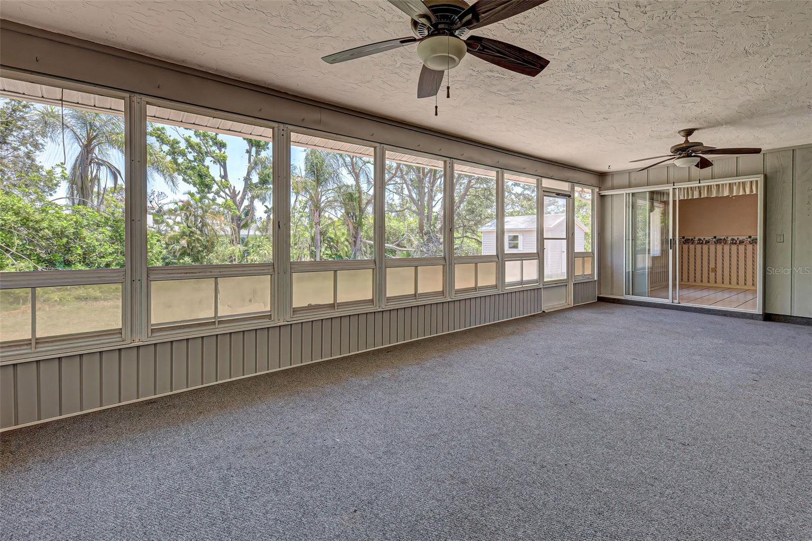 Across Florida Room Into Kitchen Area.