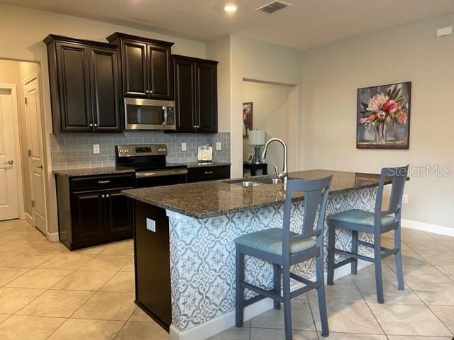 KITCHEN WITH HIGH TOP SEATING