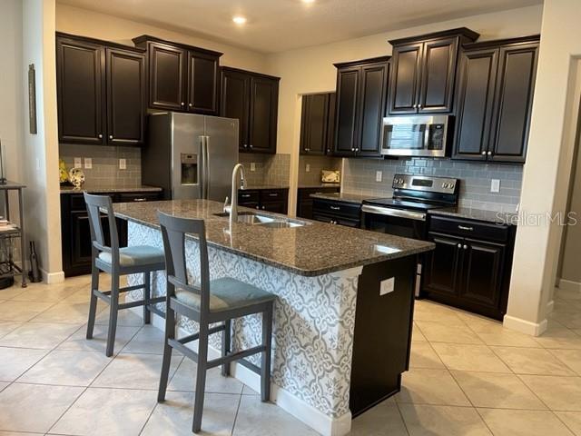 KITCHEN WITH HIGH TOP SEATING