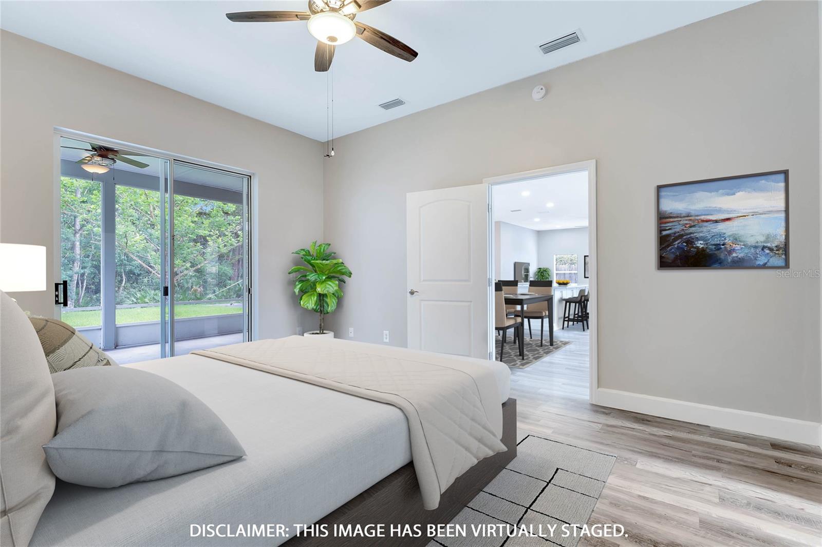 The owner's suite offers a picturesque vantage point, overlooking the breathtaking yard and captivating conservation area, creating a serene and idyllic retreat.