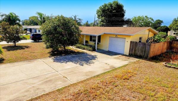 Large front yard and driveway