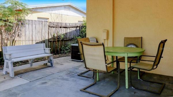 Covered patio - great space for morning coffee and entertaining!