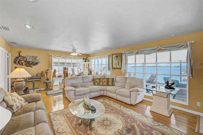 Living Room with awesome water views and beautiful wood floors.