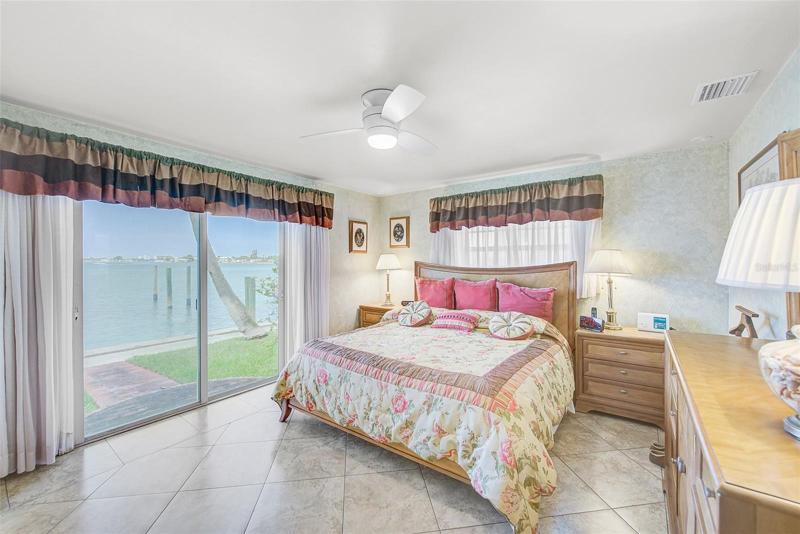 Master bedroom with slider.  Lovely views of the Water.