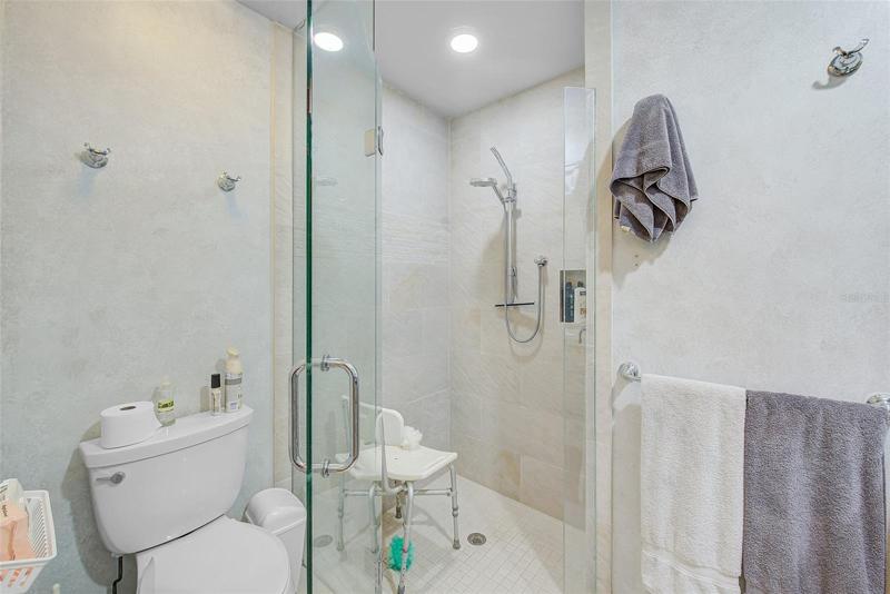 Guest bath has a walk in shower