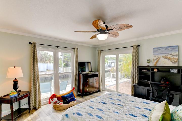 This guest bedroom is located close to the kitchen