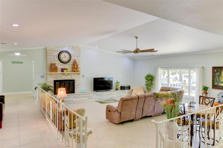 Living room with wood burning fireplace