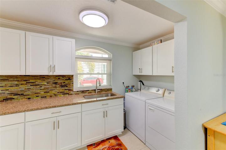 Laundry room with a sink