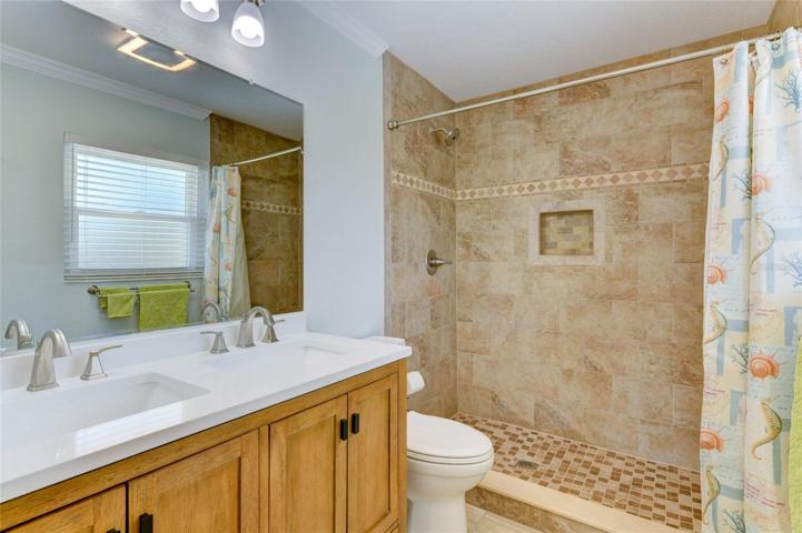 Main bathroom with a walk-in shower
