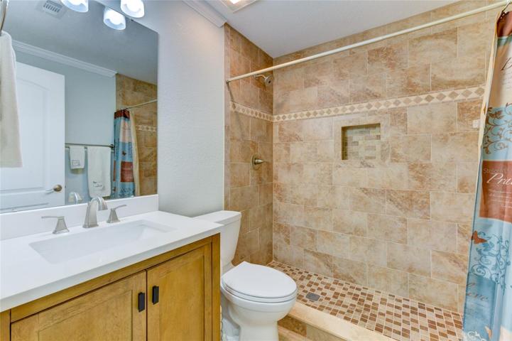 Guest bathroom with a walk-in shower