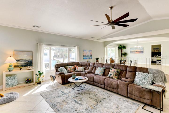 The entertainment home with large living room and dining area