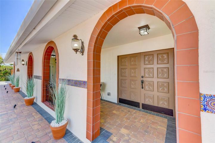 Arch entrance to the front patio