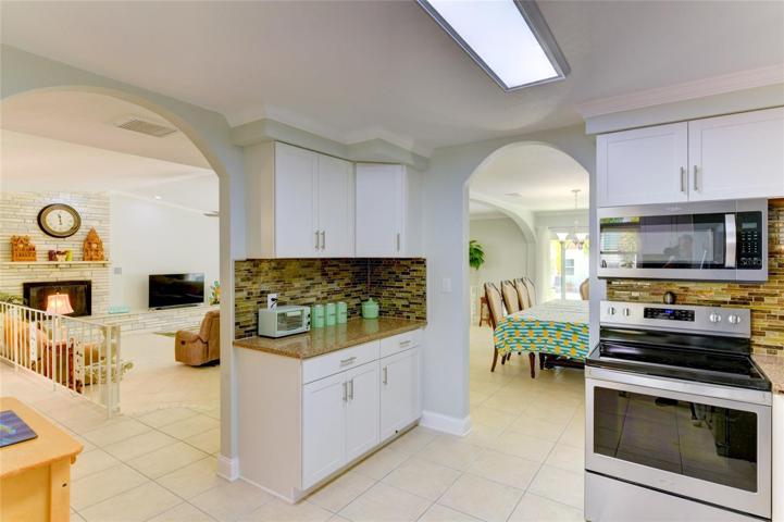 View of the living room and the dining area from the kitchen