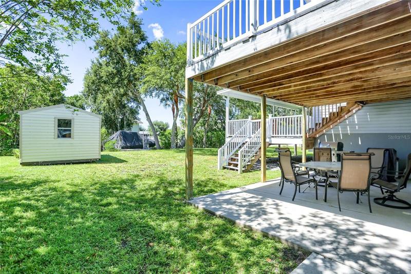lower patio with outdoor shower