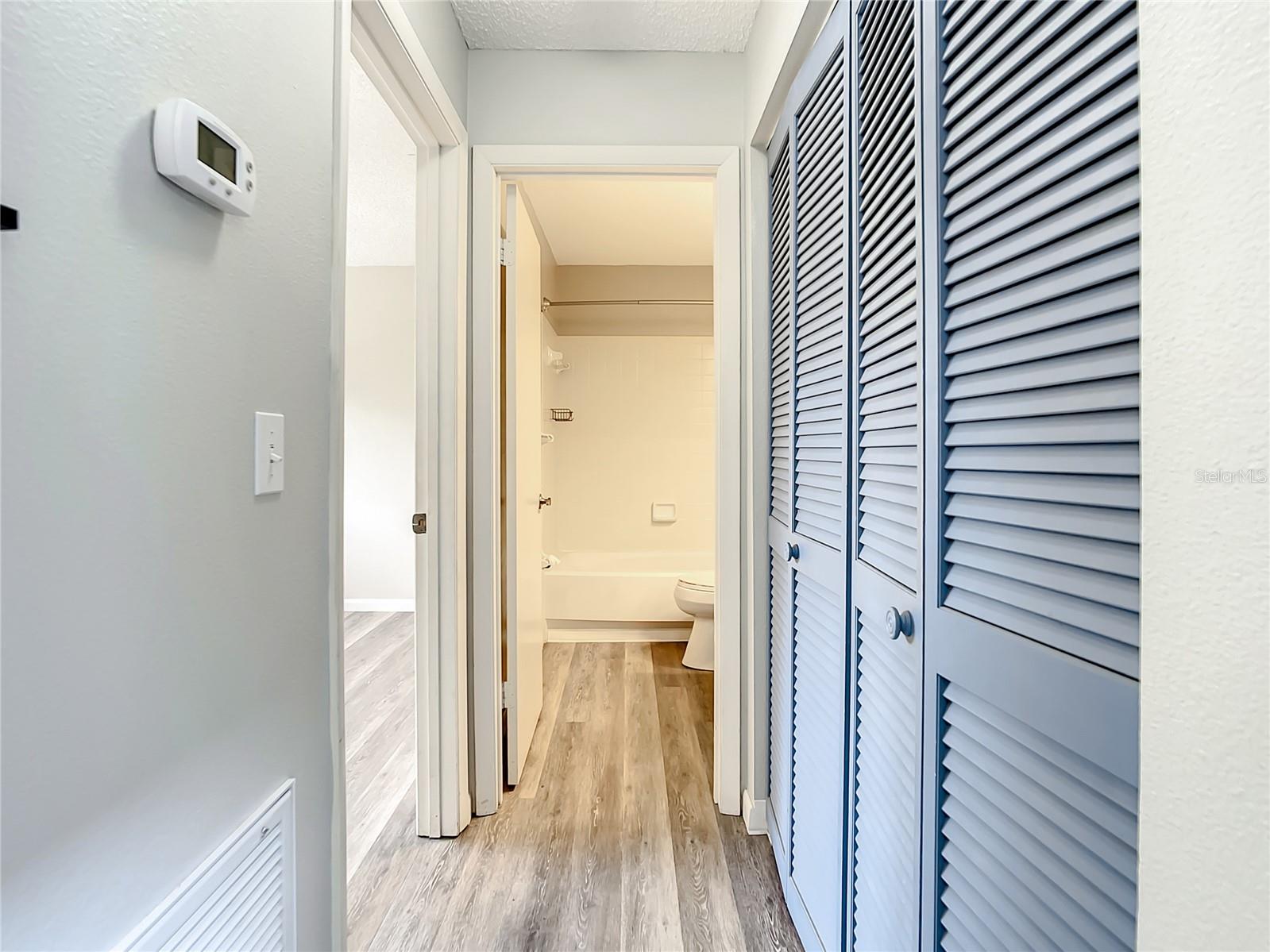 Bedroom #2 on the left, bath #2 at the end of the hall, and laundry on the right