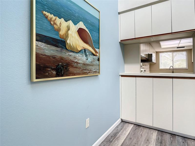 Extra cabinets in the dining area near pass through