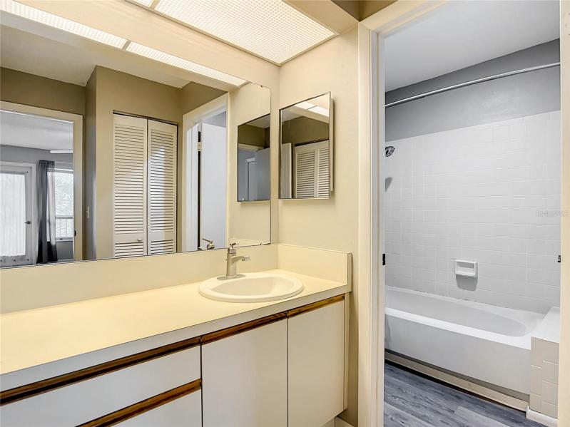 Primary bath combined tub and shower.