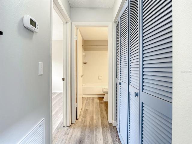 Bedroom #2 on the left, bath #2 at the end of the hall, and laundry on the right