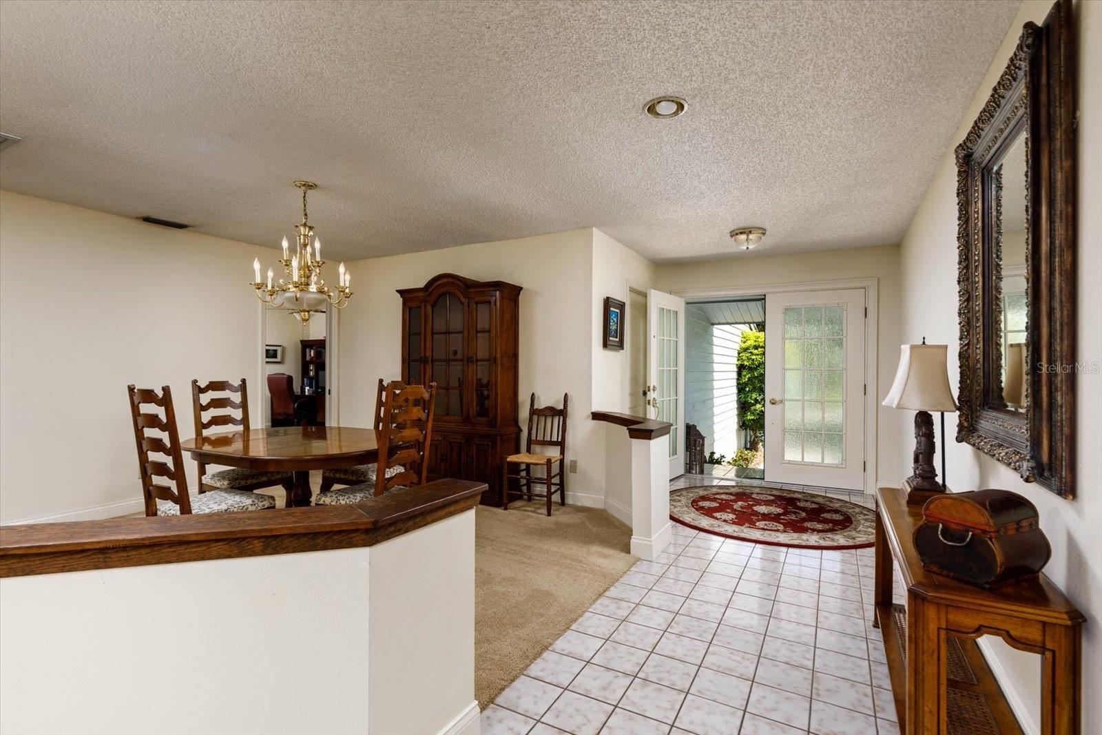 View from Living Room to Dining Room and Foyer