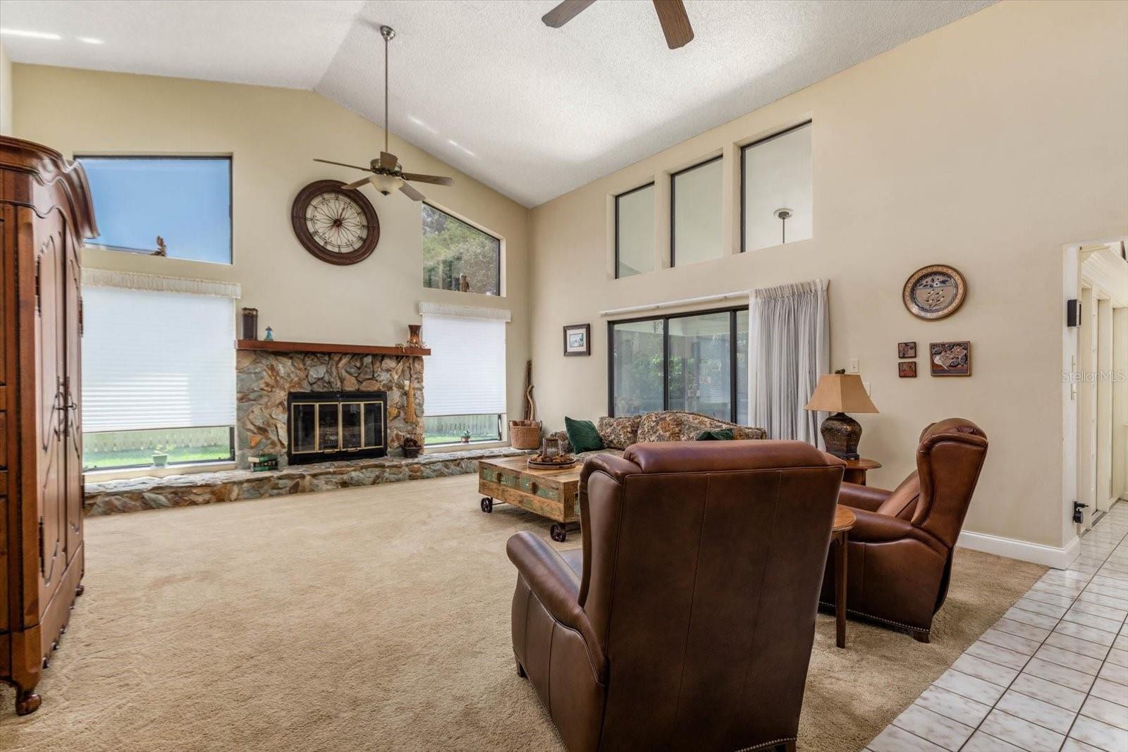 Family Room with wood burning fireplace.