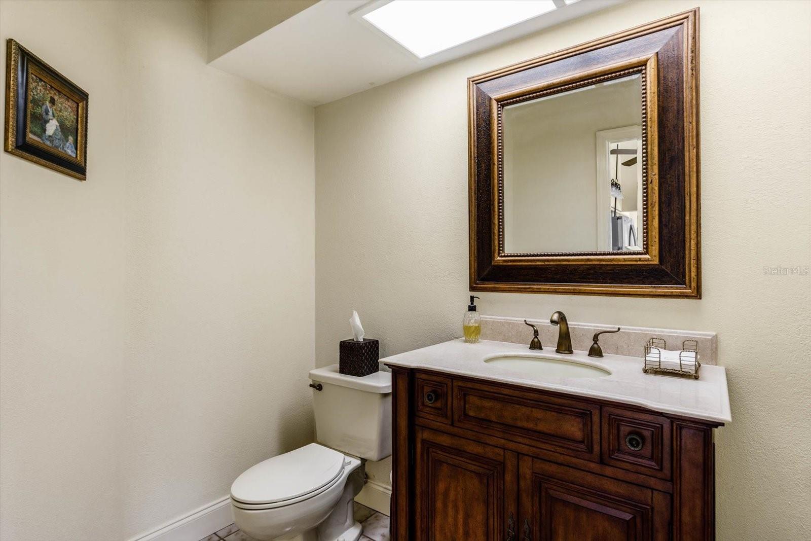 Guest half bath in center of the home.