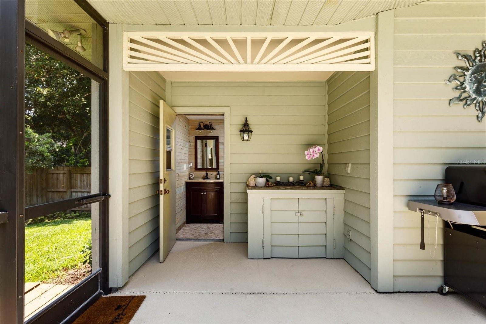 Cabana Bath entrance from pool deck.