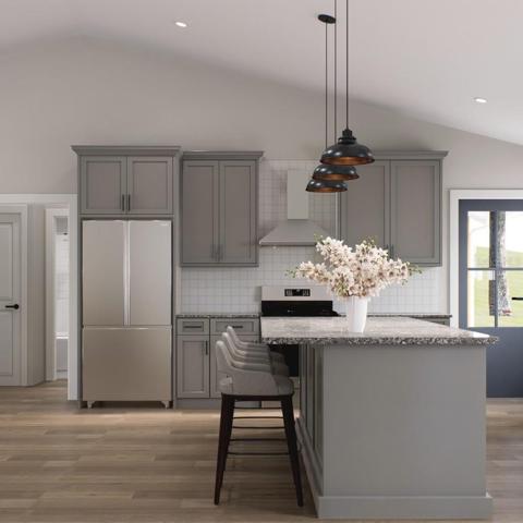 Open Kitchen with Island and stainless steal appliances