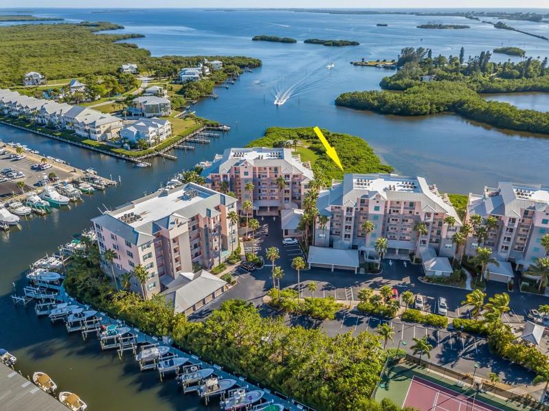 Top Floor Penthouse with Open Deck Plus Screened Lanai, and 2 Car Garage!