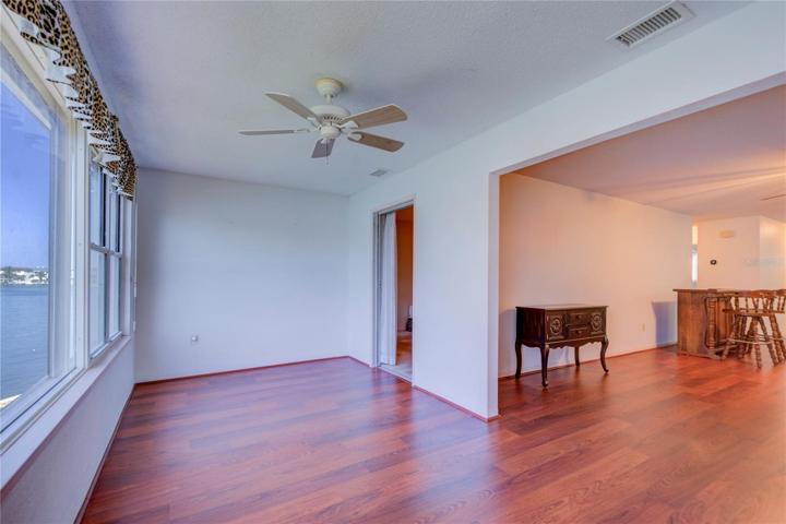 Living area w door to Primary Bedroom Suite