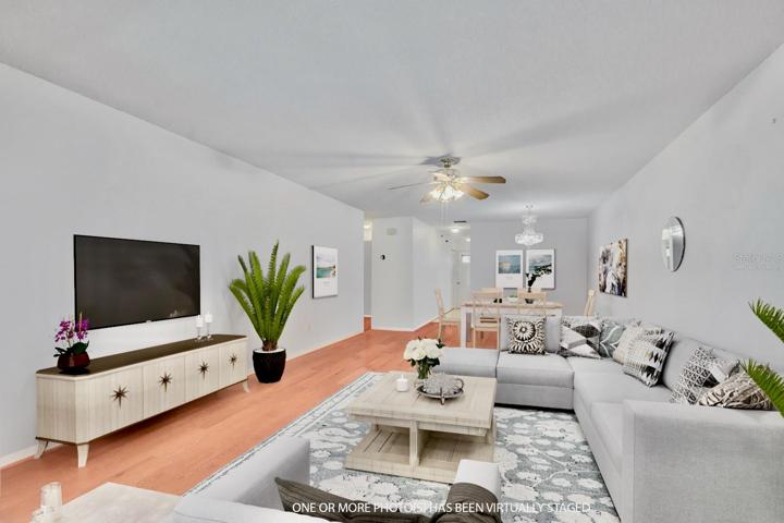 virtually staged .... living / dining area. Note: kitchen entry from hallway only as kitchen entry from dining area has been removed.
