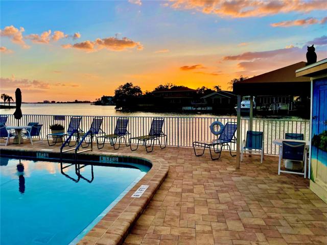 Waterfront Hampton pool just down a single flight of stairs from #211 has the perfect Westerly Sunset view over Boca Ciega Bay! 4 pools to choose from at Town Shores Gulfport!
