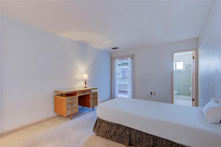 Primary Bedroom Suite w walk in closet & peek-a-boo water views