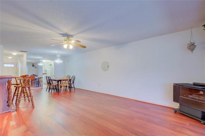 Foyer opens to kitchen and leads to a large dining / living area woth water views.