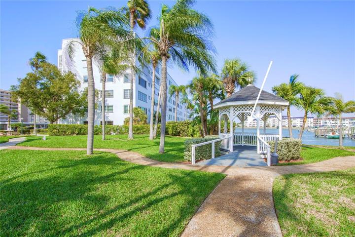 Loads of lovely green areas and sidewalks to enjoy our Florida climate!