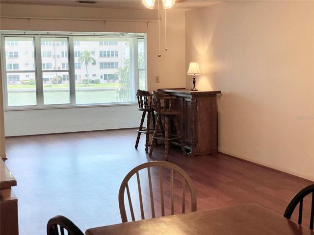 Living Area flows into large 21x9' Florida Room in Deluxe 2/2