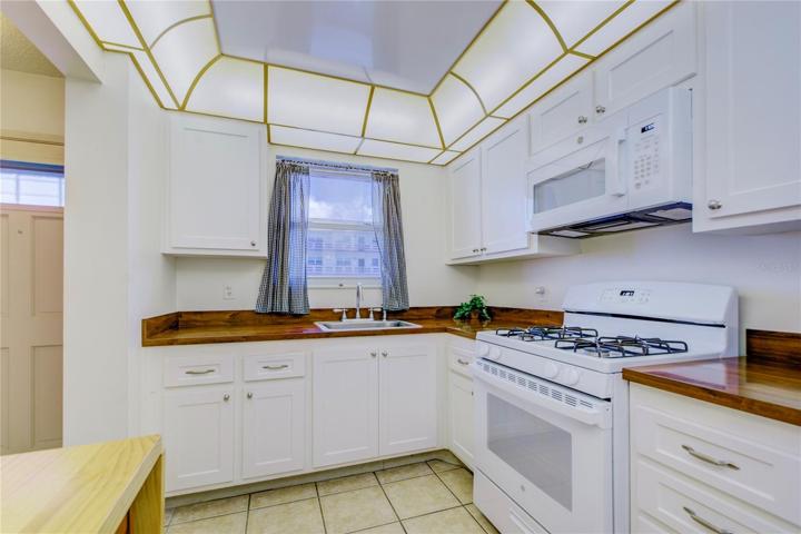 GAS COOKING in this Spacious kitchen with room for a small bistro table w 2 chairs