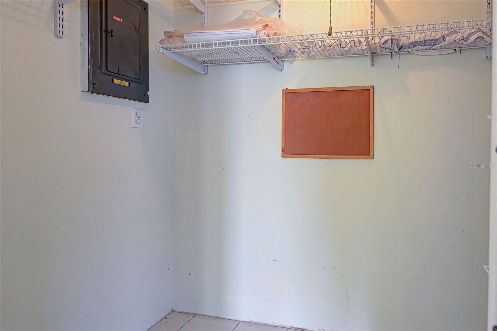 Walk-in closet for additional storage, pool toys, fishing poles, etc